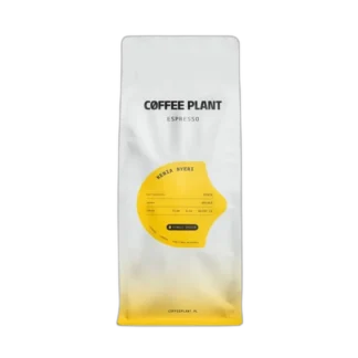 Białe opakowanie kawy ziarnistej Coffee Plant Kenia Nyeri 1 kg z żółtą etykietą, dostępne w sklepie z kawą specialty